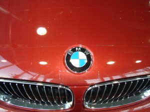 clearbra-competition-bad-work-vancouver-clearbra-bad-competition-work-2009-bmw-135i-red-brian-jessel-bmw-paint-protection-film-hood